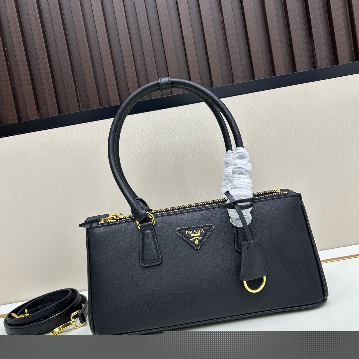 Pra*a top handle bags